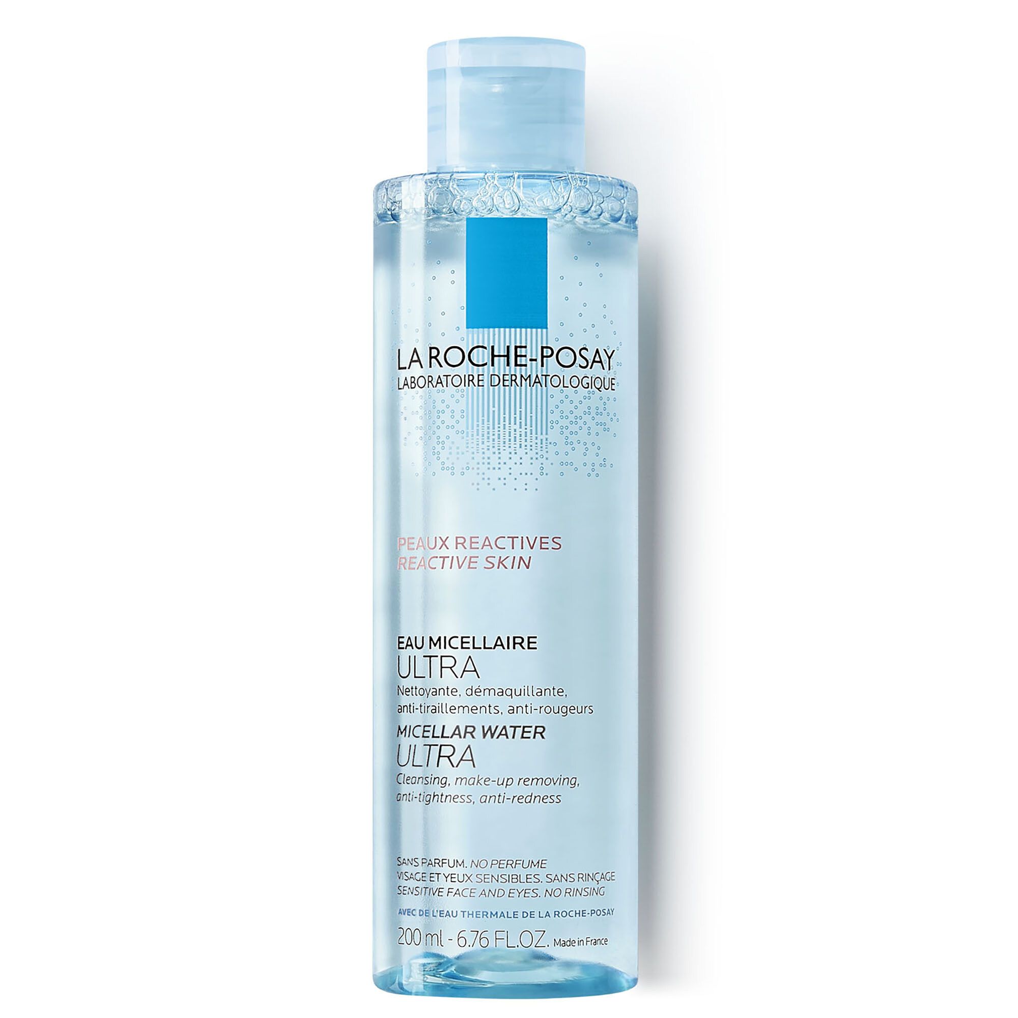La Roche-Posay Mizellen Reinigungsfluid Reaktiv. Flacon bleu avec bouchon bleu. Texte: Eau Micellaire Ultra, pour peaux sensibles.