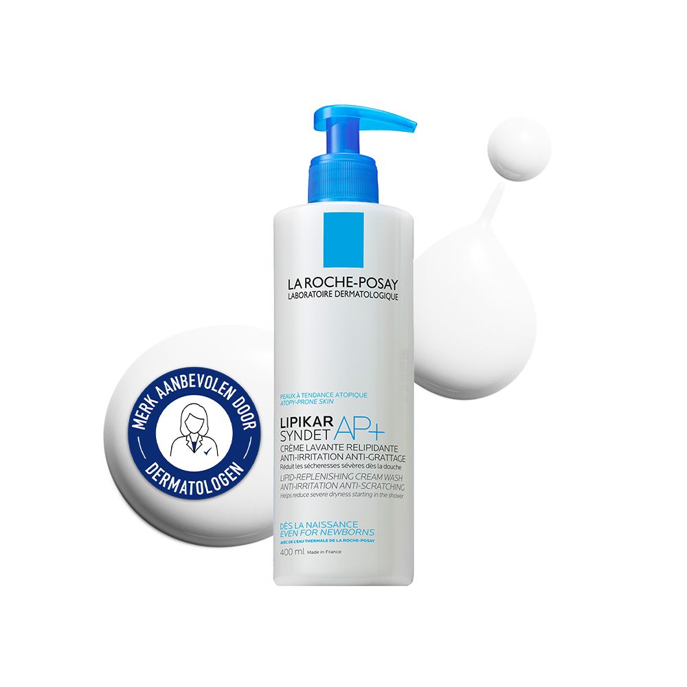 Witte dispenser met blauwe pomp. Opschrift: La Roche-Posay, Lipikar Syndet AP+. Dermatologen zegel.