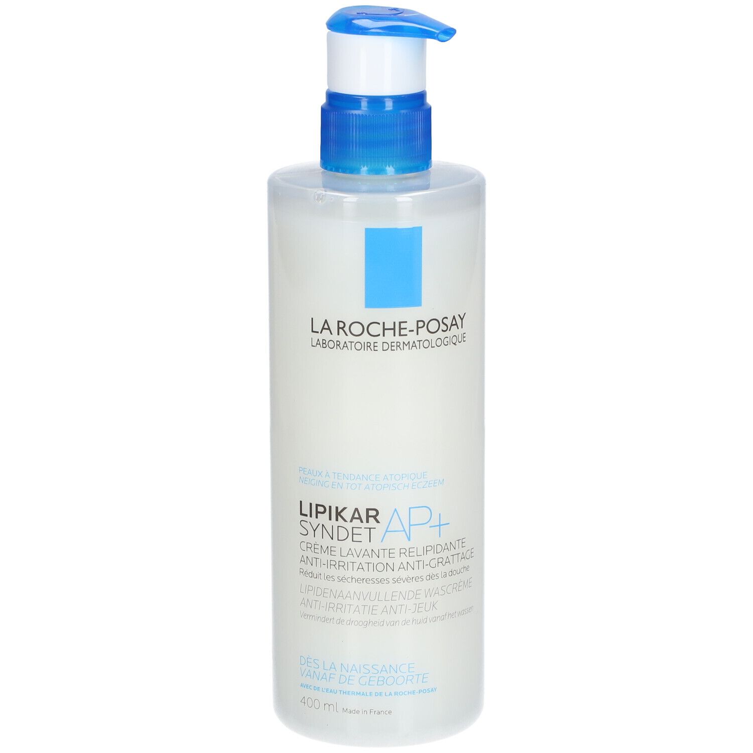 Witte dispenser met blauwe pomp. Opschrift: La Roche-Posay, Lipikar Syndet AP+.