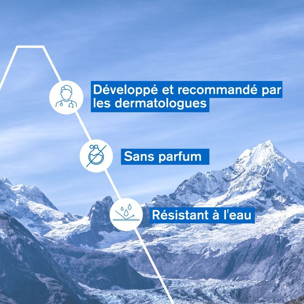 Tube blanc et bleu Uriage BARIÉDERM-CICA Crème Mains. Inscription en français. 50ml.