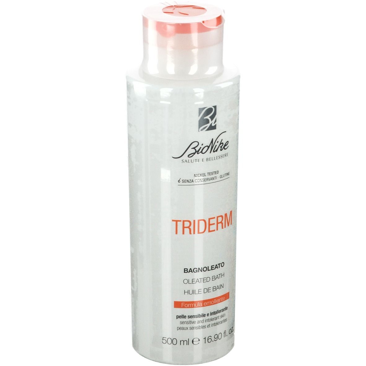 Witte fles BioNike TRIDERM Badeöl met rode dop. Opschriften: Bagnoleato, Oileated Bath, Huile de Bain. Logo en merknaam.