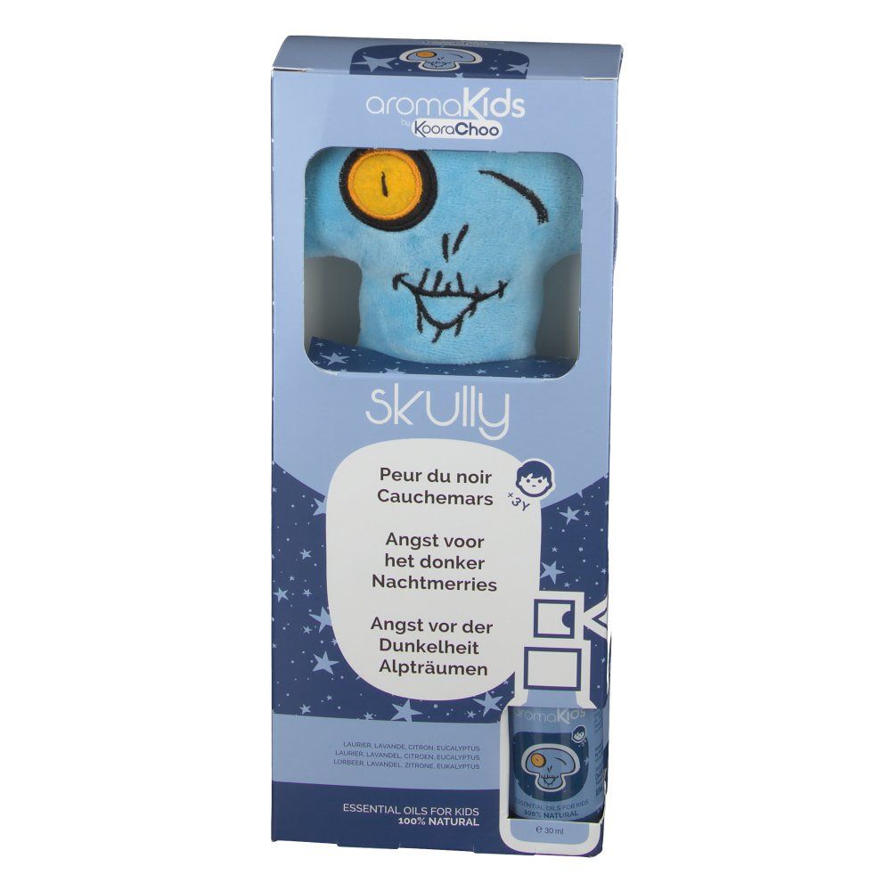 Productverpakking met blauwe knuffel in schedelvorm. Gedrukte schedel met gele oog. Productnaam en teksten in verschillende talen.