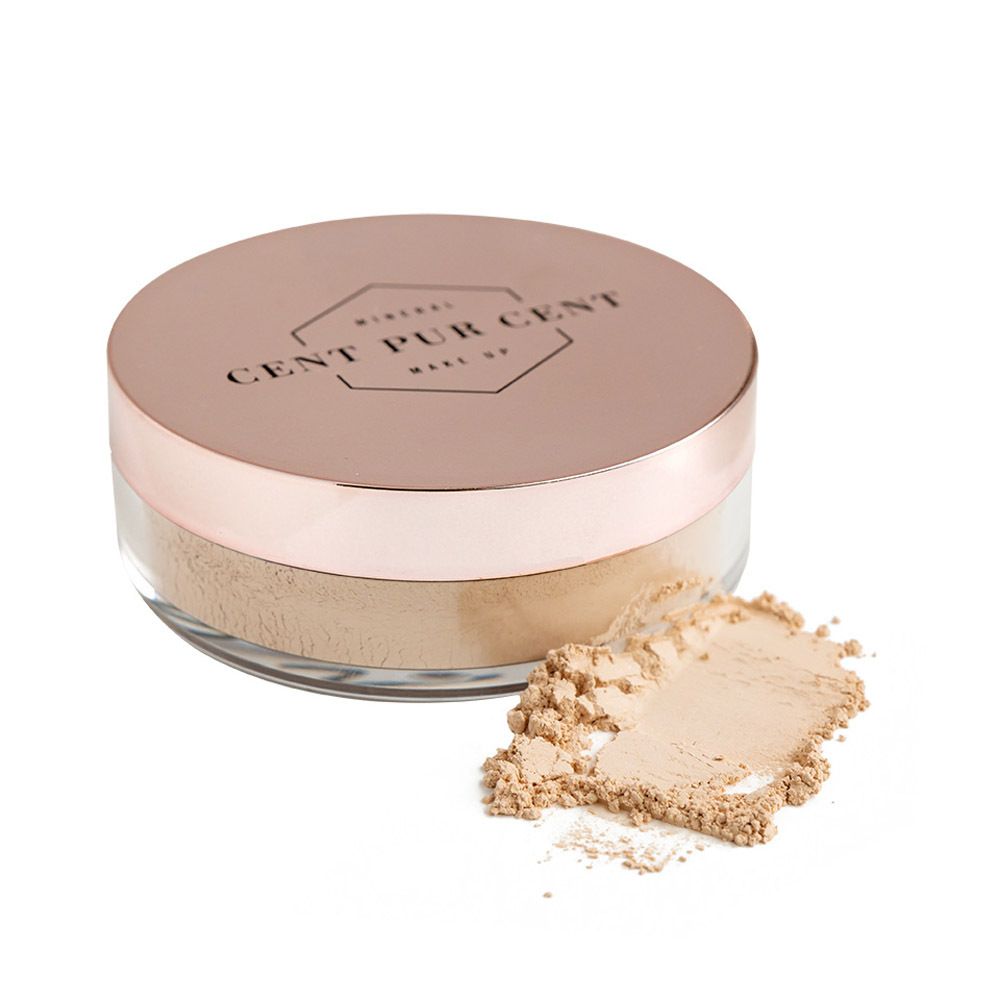 Pot de maquillage minéral en poudre. Couvercle rose avec texte. Poudre à côté.