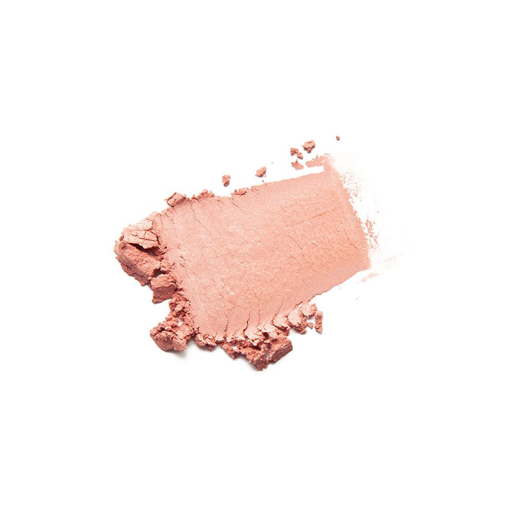 Poudre rose sur fond blanc. Trace de poudre.