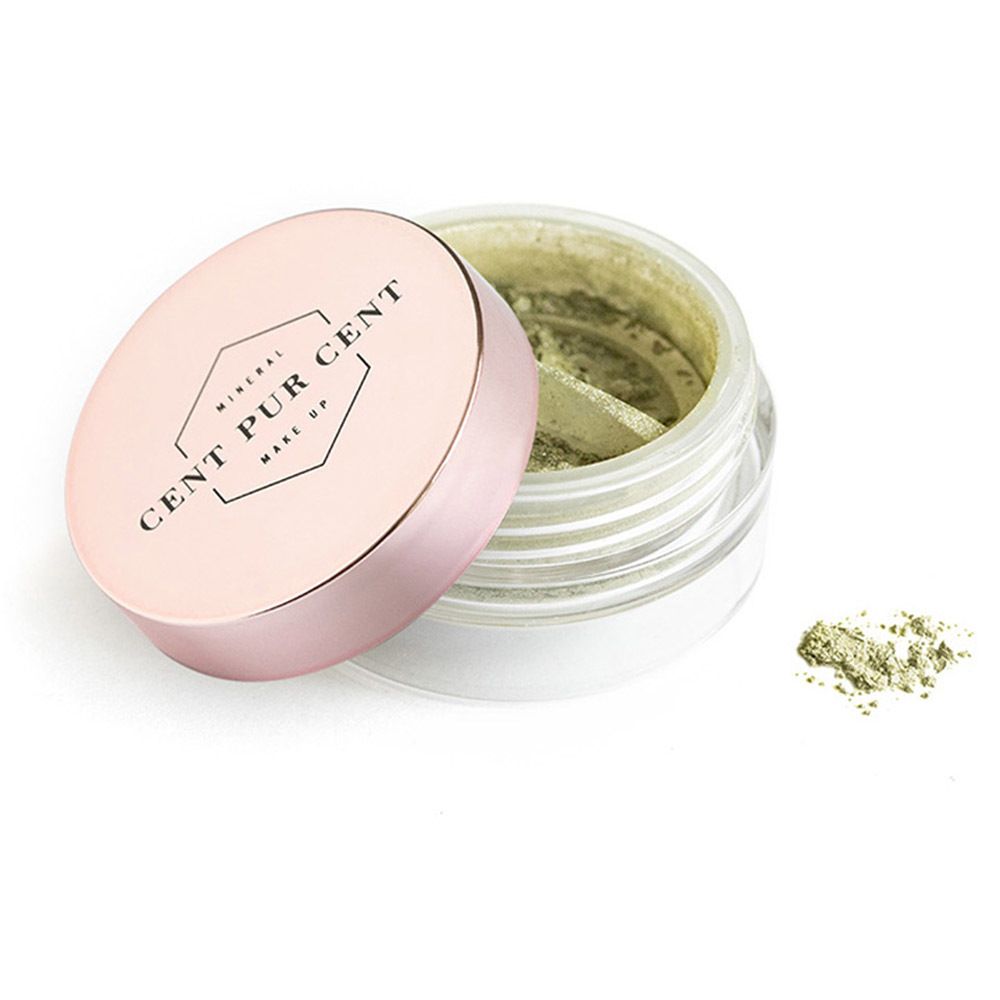 Pot de fard à paupières avec couvercle rose. Inscription : Cent Pur Cent. Pot ouvert avec fard à paupières vert. Éparpillement à côté.