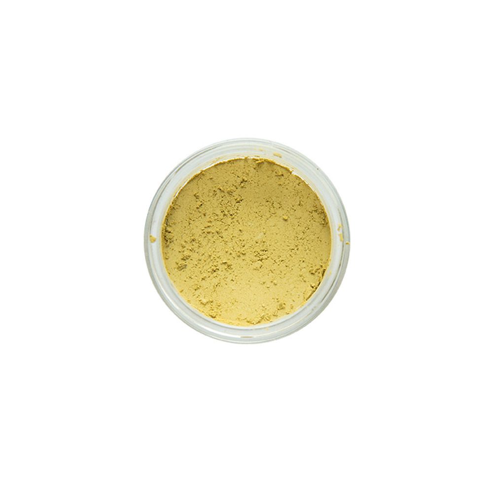 Vue de dessus d'un pot de fard à paupières jaune-vert.