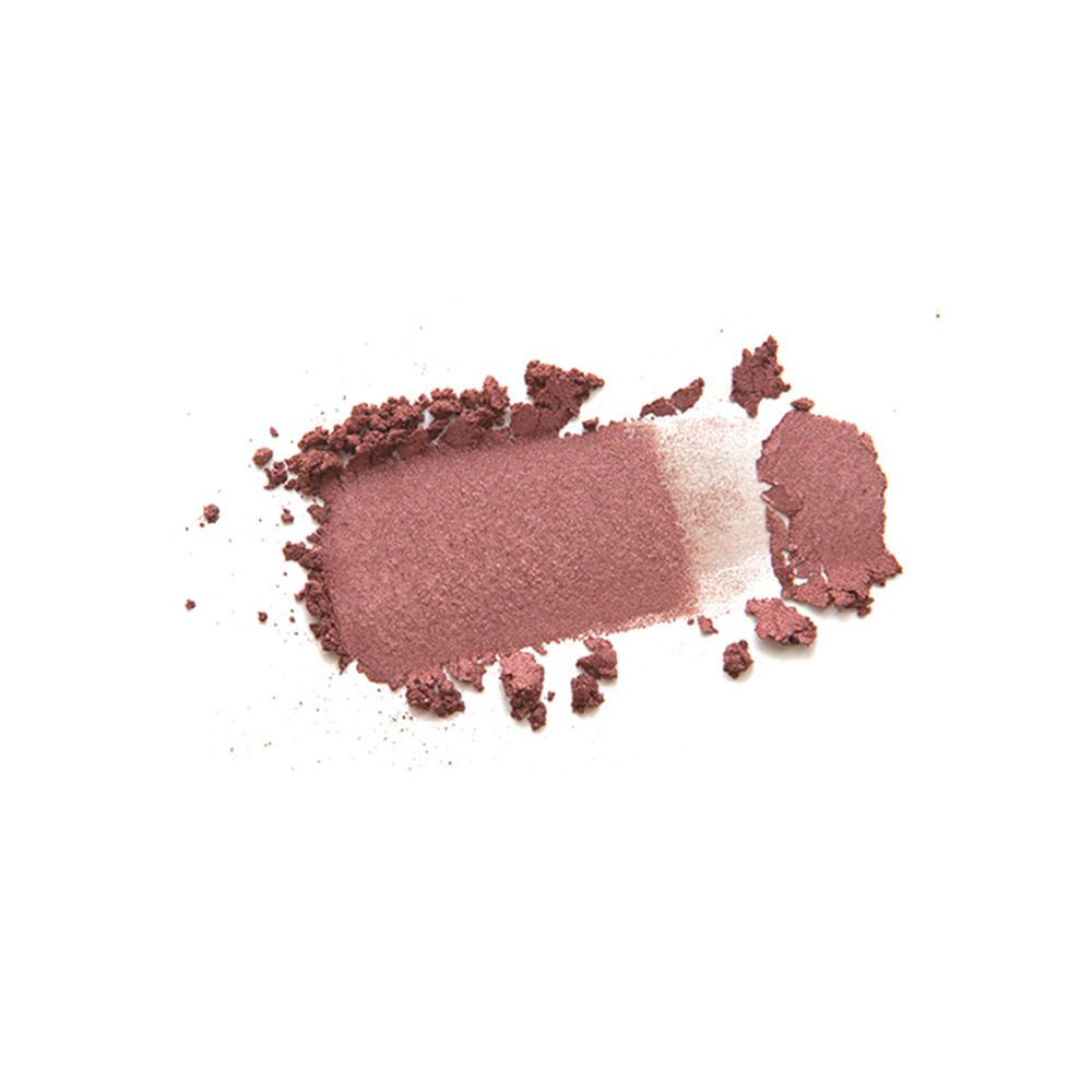 Échantillon de fard à paupières. Fard à paupières brun-rouge. Sur fond clair.
