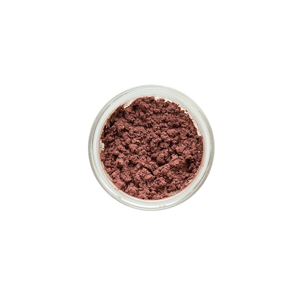 Pot de fard à paupières. Fard à paupières brun-rouge. Sur fond clair.