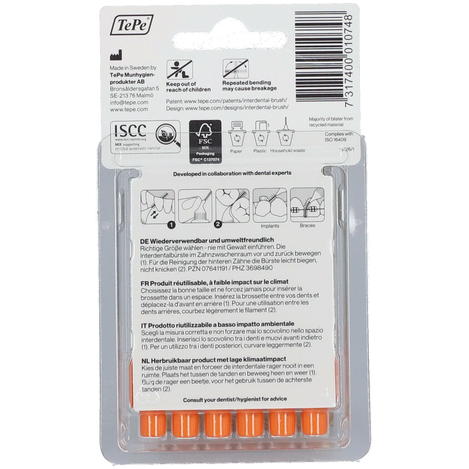 Rückseite der Blisterverpackung mit sechs orangefarbenen Interdentalbürsten. Textinformationen und Logos.