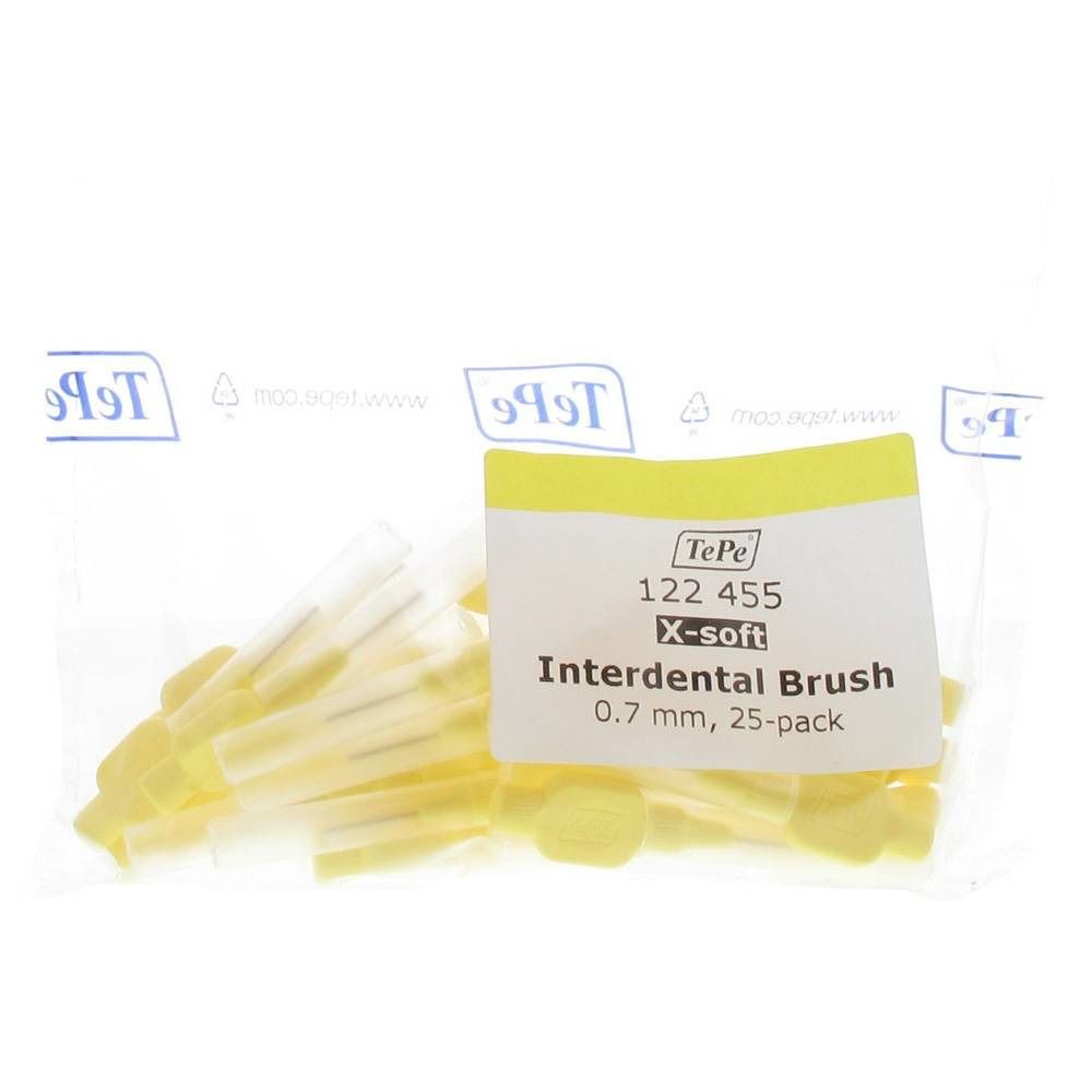 Brosses interdentaires dans un emballage transparent. Étiquette avec informations produit : 0,7 mm, 25 pièces.