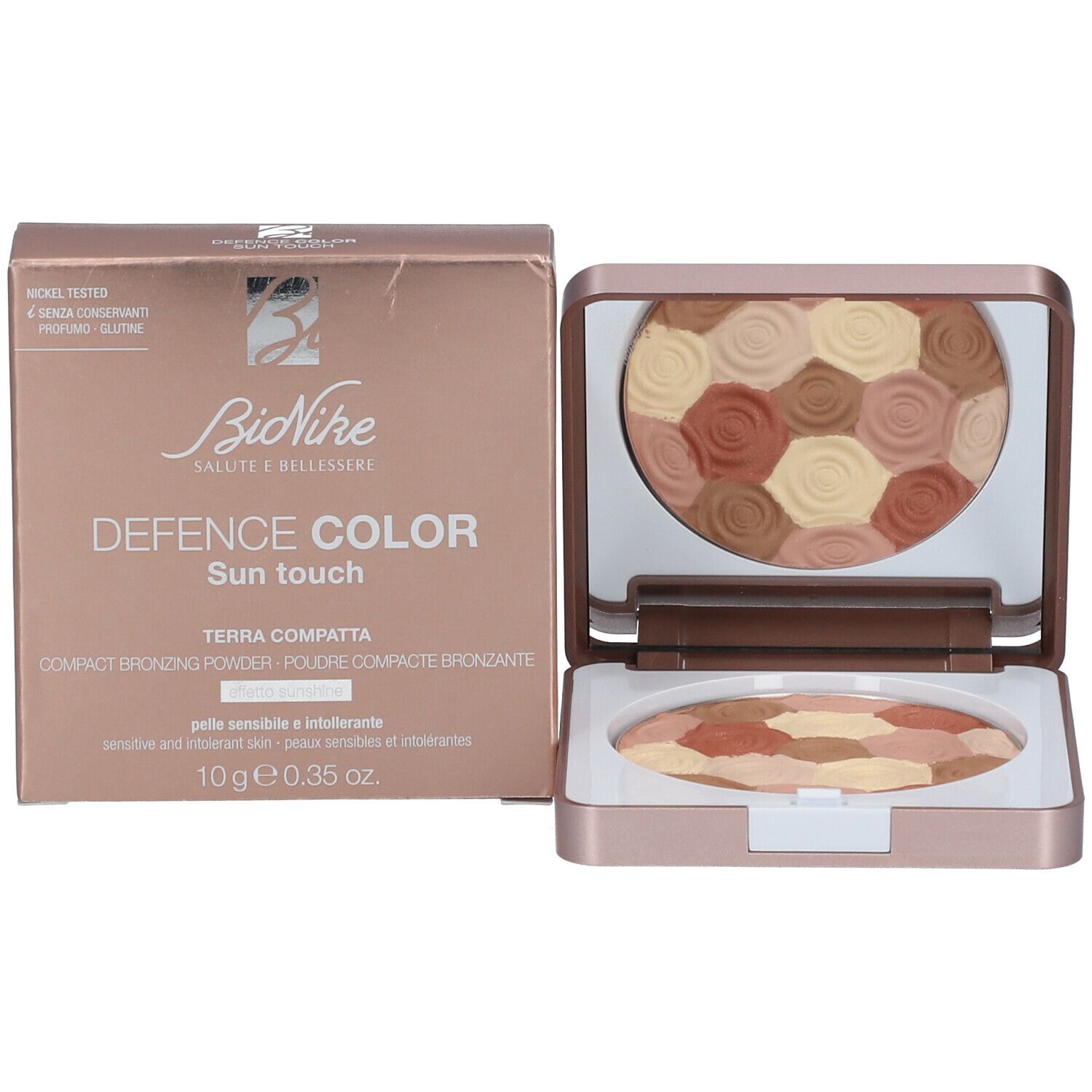 Compacte bronzer met verpakking. Roze gouden behuizing. 'BioNike DEFENCE COLOR Sun touch'.