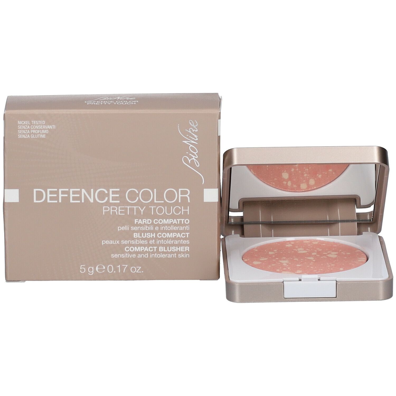 Kompakt-Blush mit Verpackung. Rosa Farbton mit hellen Sprenkeln. Goldfarbene Hülle mit weißem Innenraum. Karton.