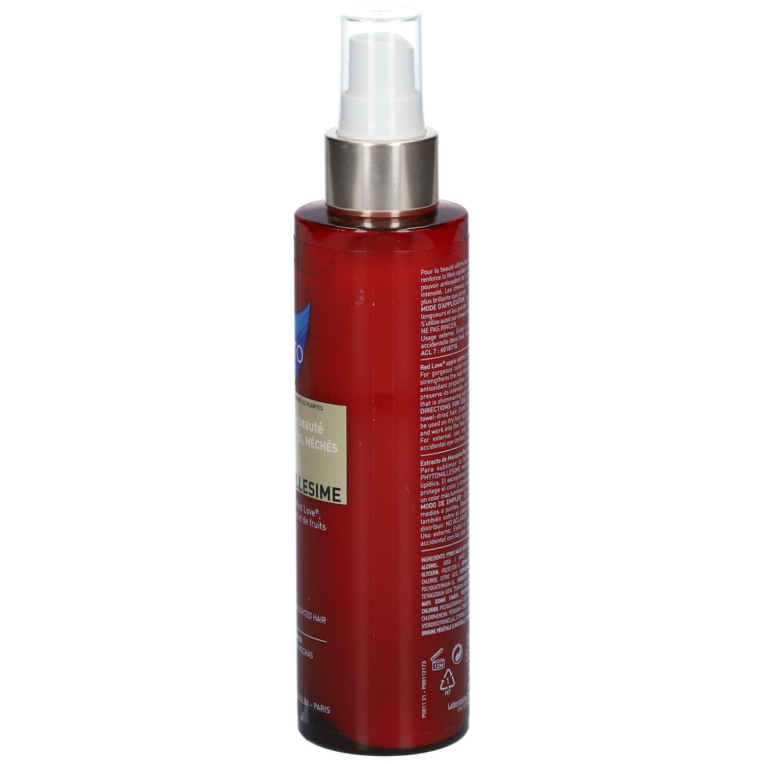 Flacon rouge avec vaporisateur blanc. Texte au dos en plusieurs langues. Nom du produit et informations du fabricant.