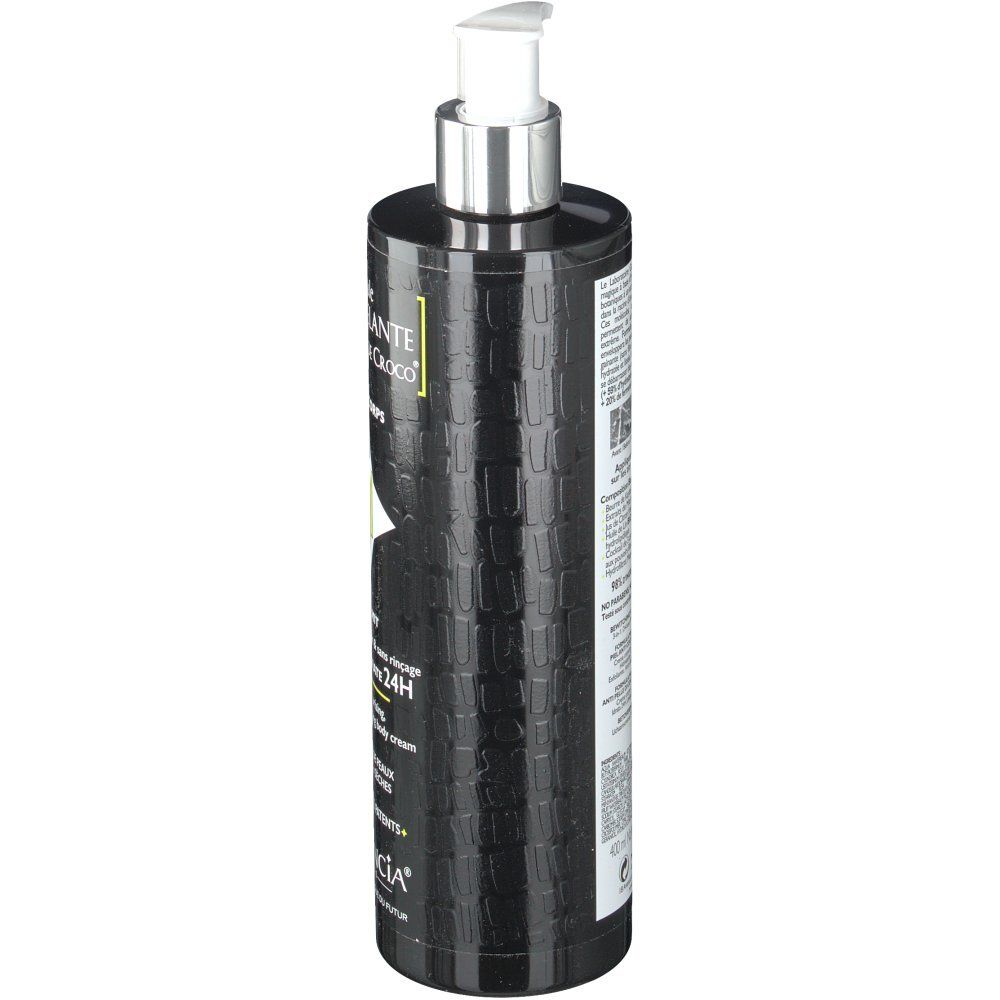 Schwarze Flasche mit Pumpe. Seite mit Text. Marke: Garancia. Produktname teilweise sichtbar.