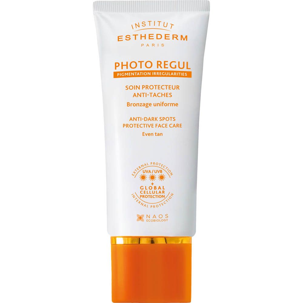 Tube blanc-orange avec nom du produit et texte. Protection solaire pour pigmentation irrégulière.