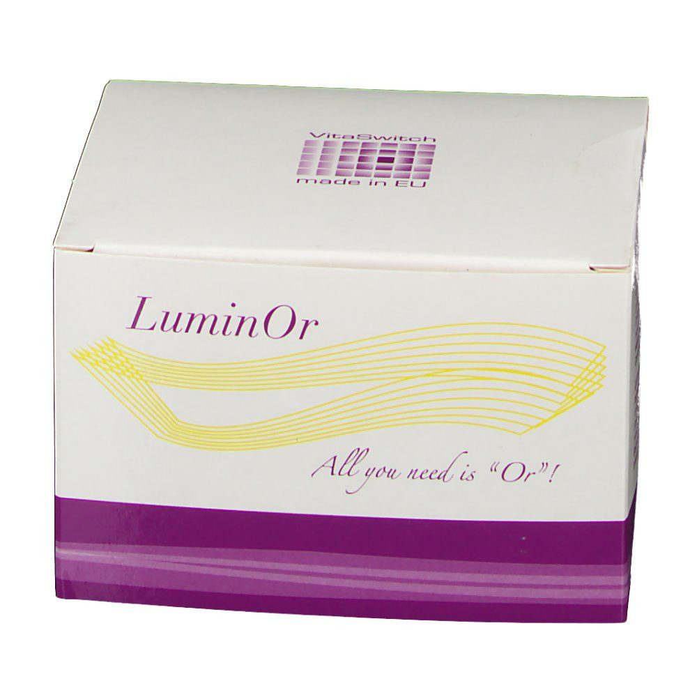 Boîte blanche à rayures violettes. Inscription : LuminOr, VitaSwitch, made in EU. Lignes jaunes.
