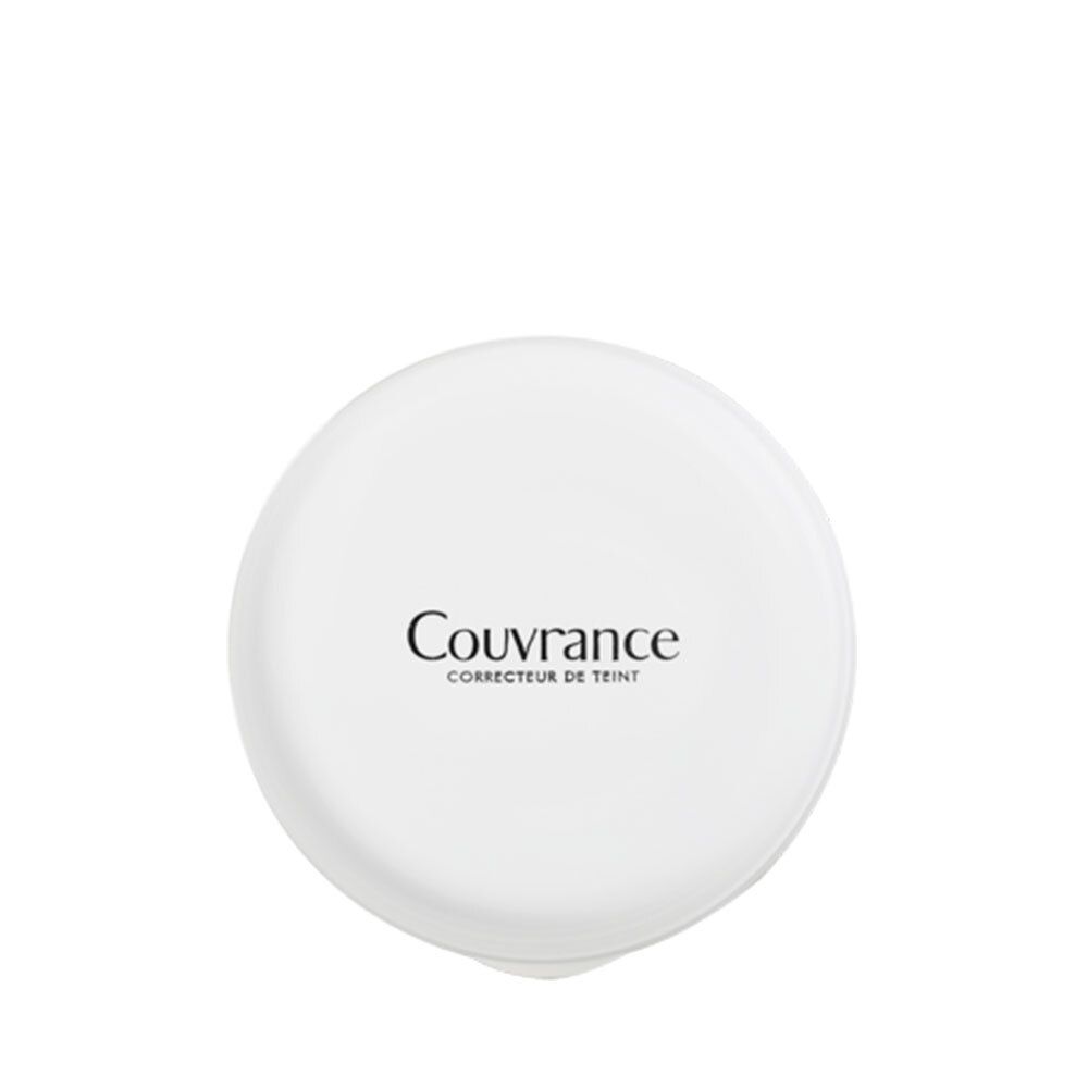 Boîtier rond blanc avec l'inscription 'Couvrance' et 'Correcteur de Teint'.