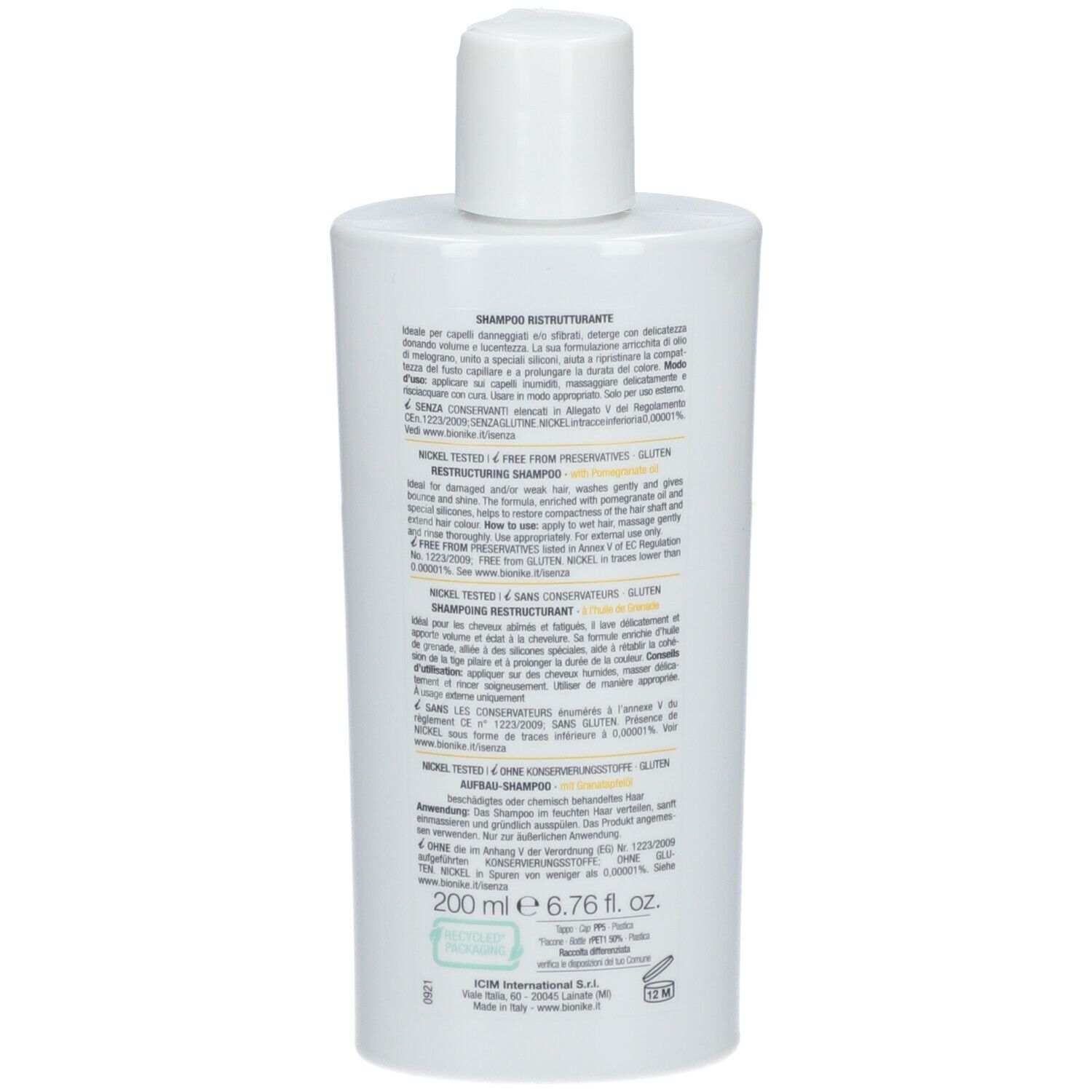 Achterkant van de witte shampoo fles. Tekst in meerdere talen. Volume: 200 ml.