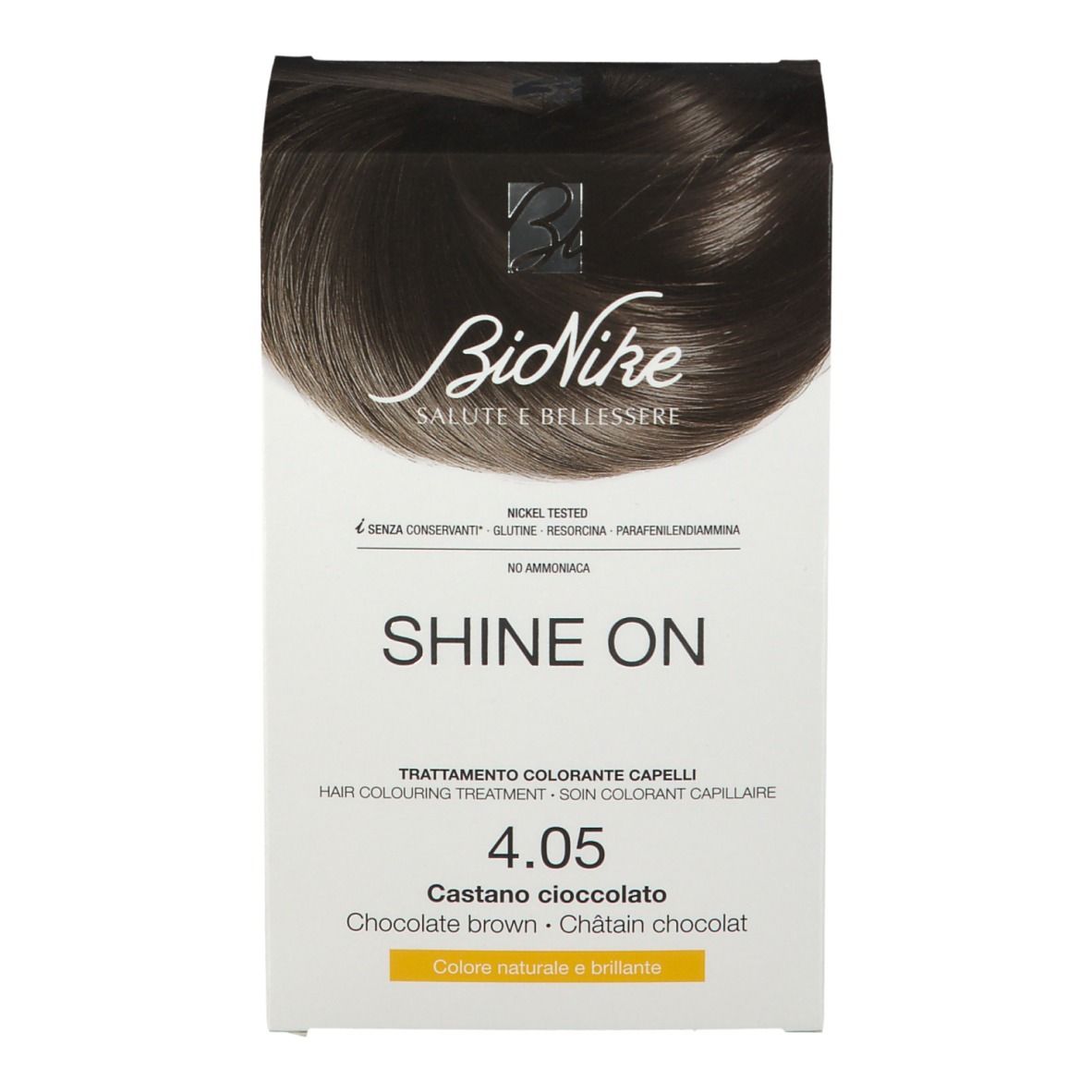 BioNike SHINE ON 4.05 Kastanje-chocolade. Haarkleurbehandeling. Verpakking met afbeelding en tekst. Bevat 50ml, 75ml en 20ml.