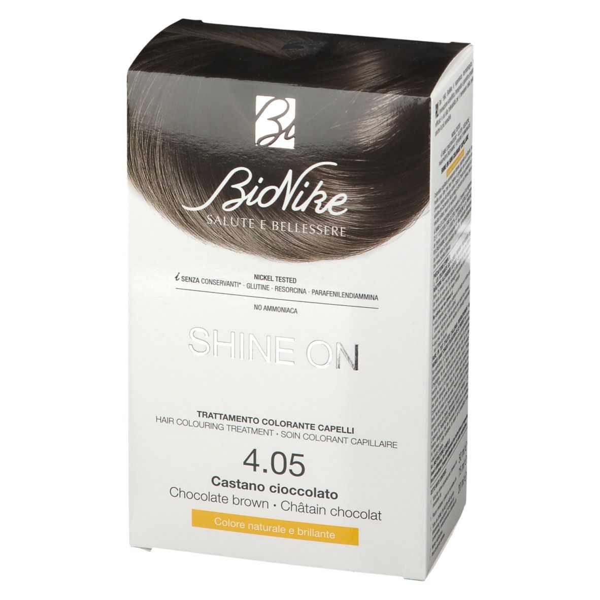 BioNike SHINE ON 4.05 Kastanje-chocolade. Haarkleurbehandeling. Verpakking met afbeelding en tekst. Bevat 50ml, 75ml en 20ml.