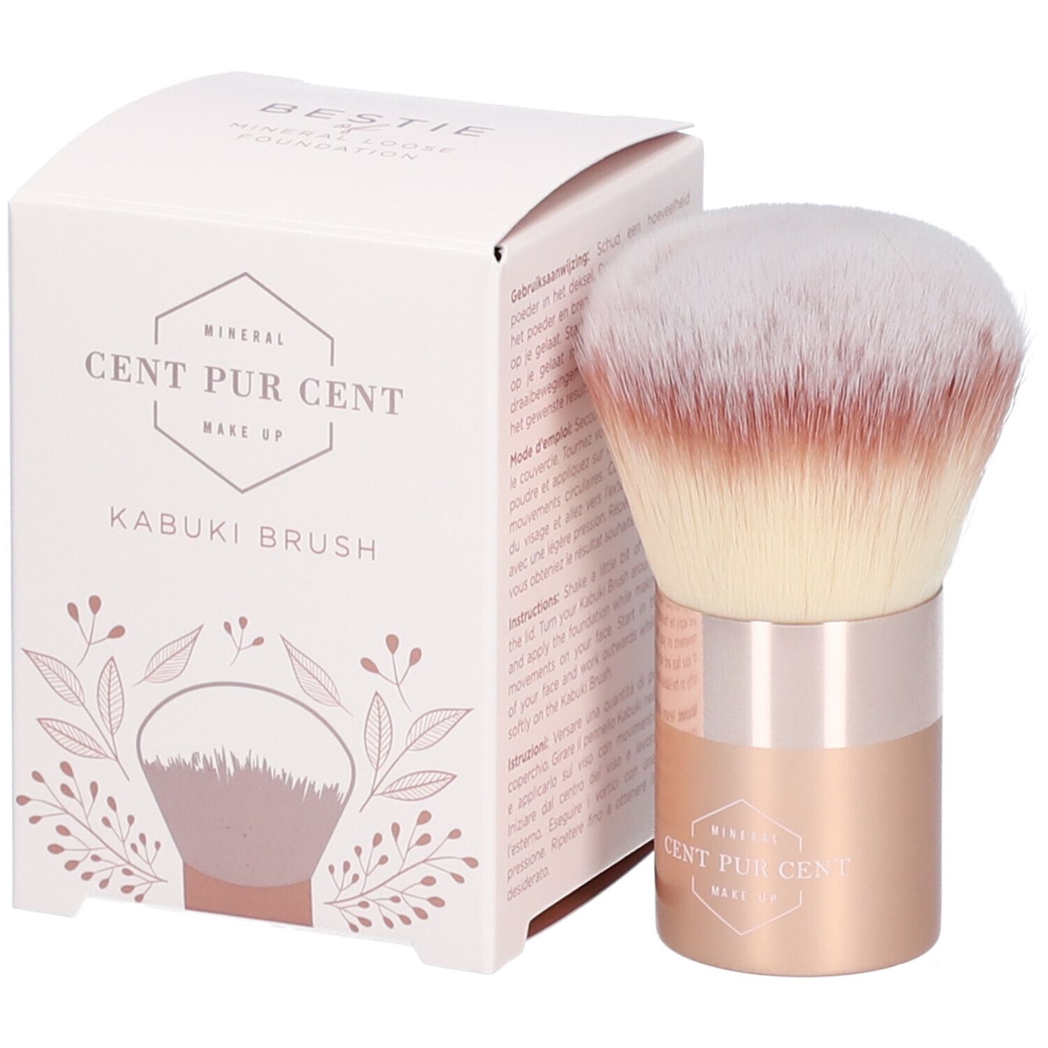 Pinceau Kabuki et emballage. Pinceau avec poils blancs et bruns, manche or rose. Texte sur l'emballage.
