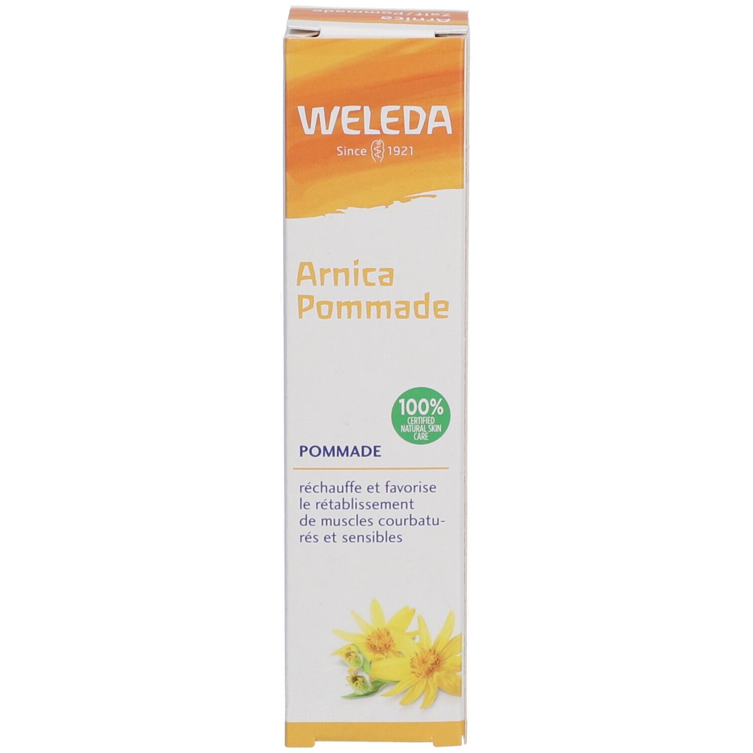 Weleda Arnica Pommade doos. Wit met geel-oranje logo en productnaam. Bevat 100% Natural zegel.