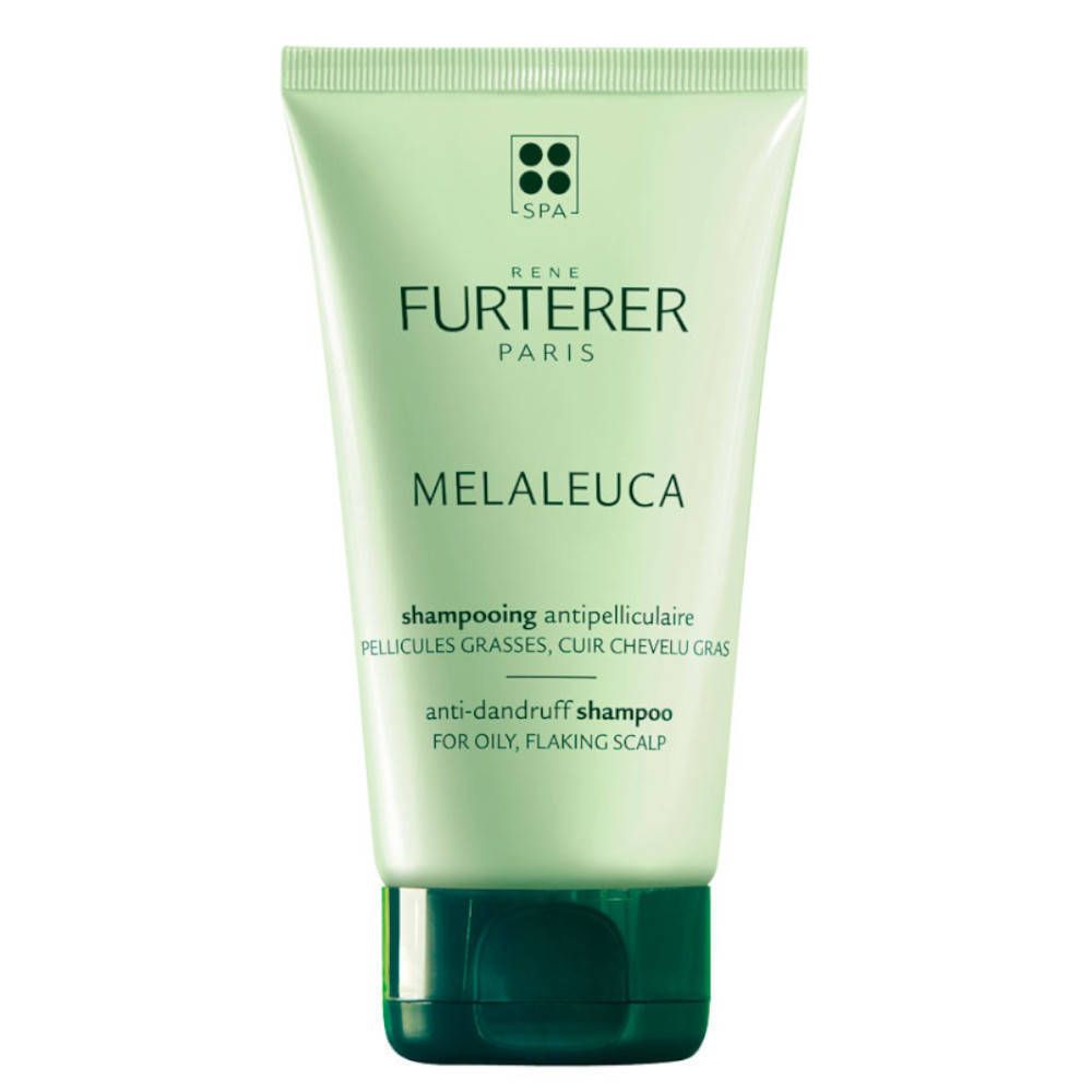 Tube vert de shampooing. Inscriptions: RENE FURTERER PARIS, MELALEUCA, shampooing antipelliculaire pour cuir chevelu gras et squameux.