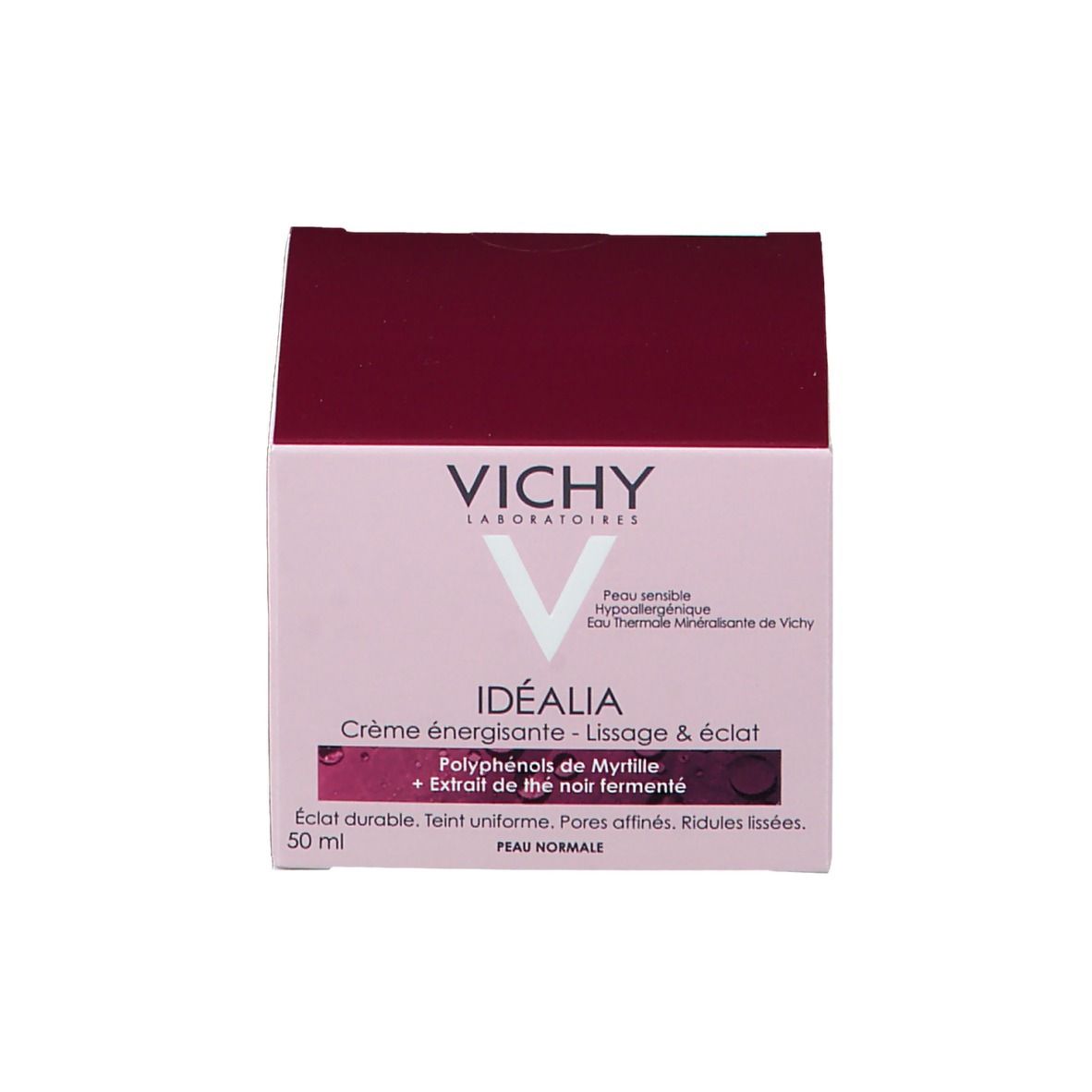 Roze doos met productinformatie. Op de verpakking staat "VICHY IDEALIA".