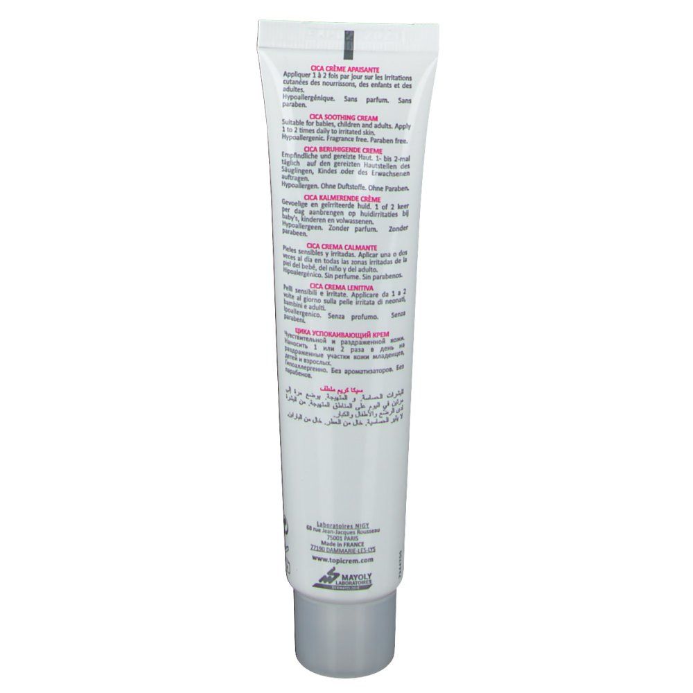 Dos d'un tube blanc avec texte multilingue. Contient des informations d'utilisation.