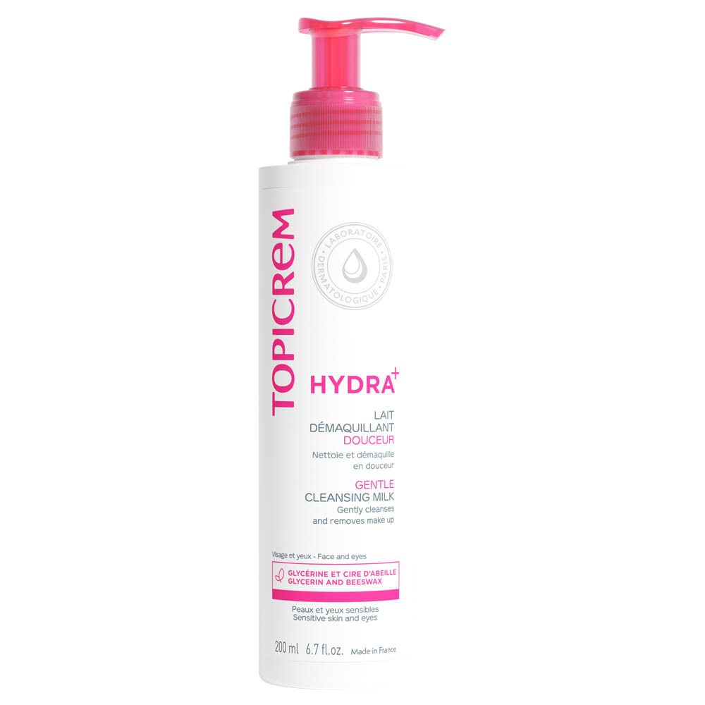 Weiße Flasche mit rosa Pumpverschluss. Aufschrift TOPICREM HYDRA+, LAIT DÉMAQUILLANT DOUCEUR, GENTLE CLEANSING MILK. Für empfindliche Haut.