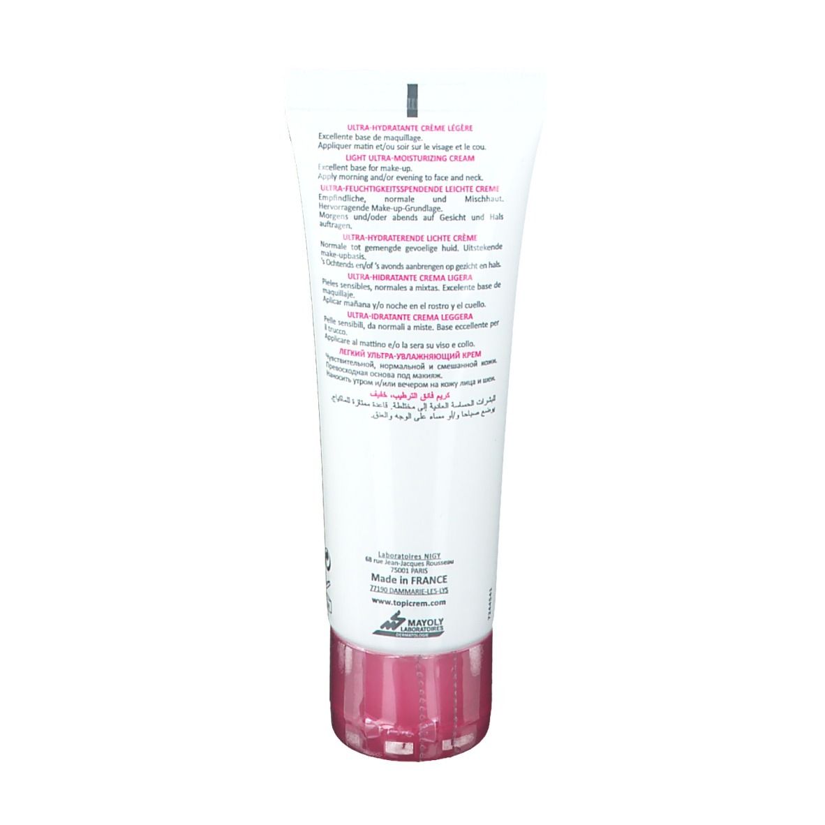 Dos d'un tube blanc avec accents roses. Texte multilingue. Informations fabricant. Fabriqué en France.