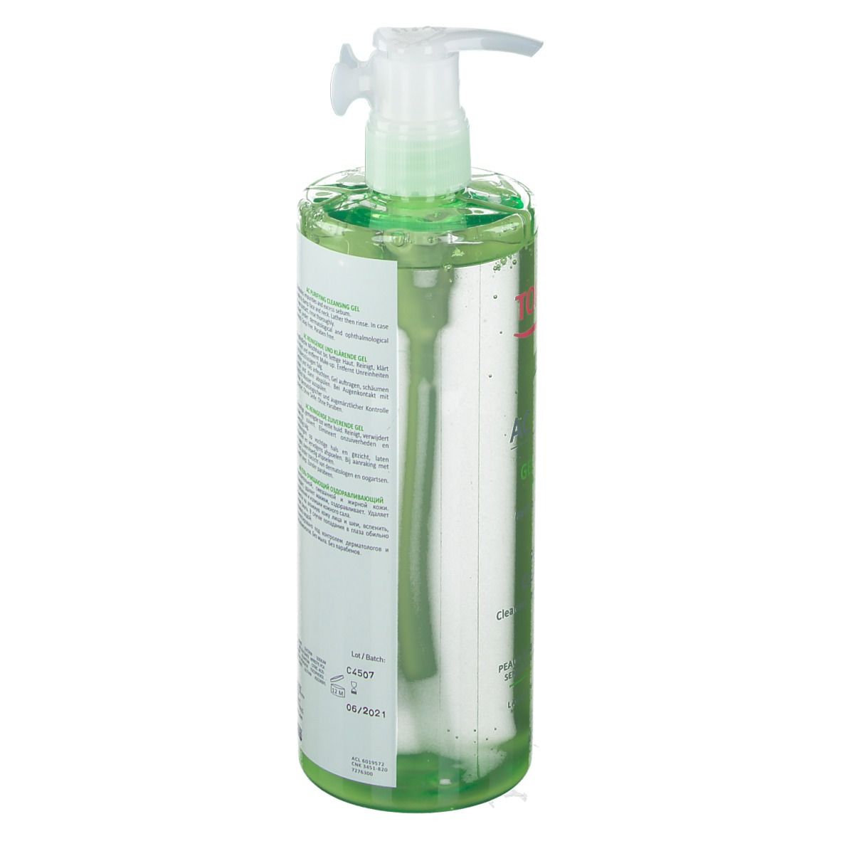 Flacon vert avec pompe. Dos avec texte et code-barres. Nom du produit non visible.