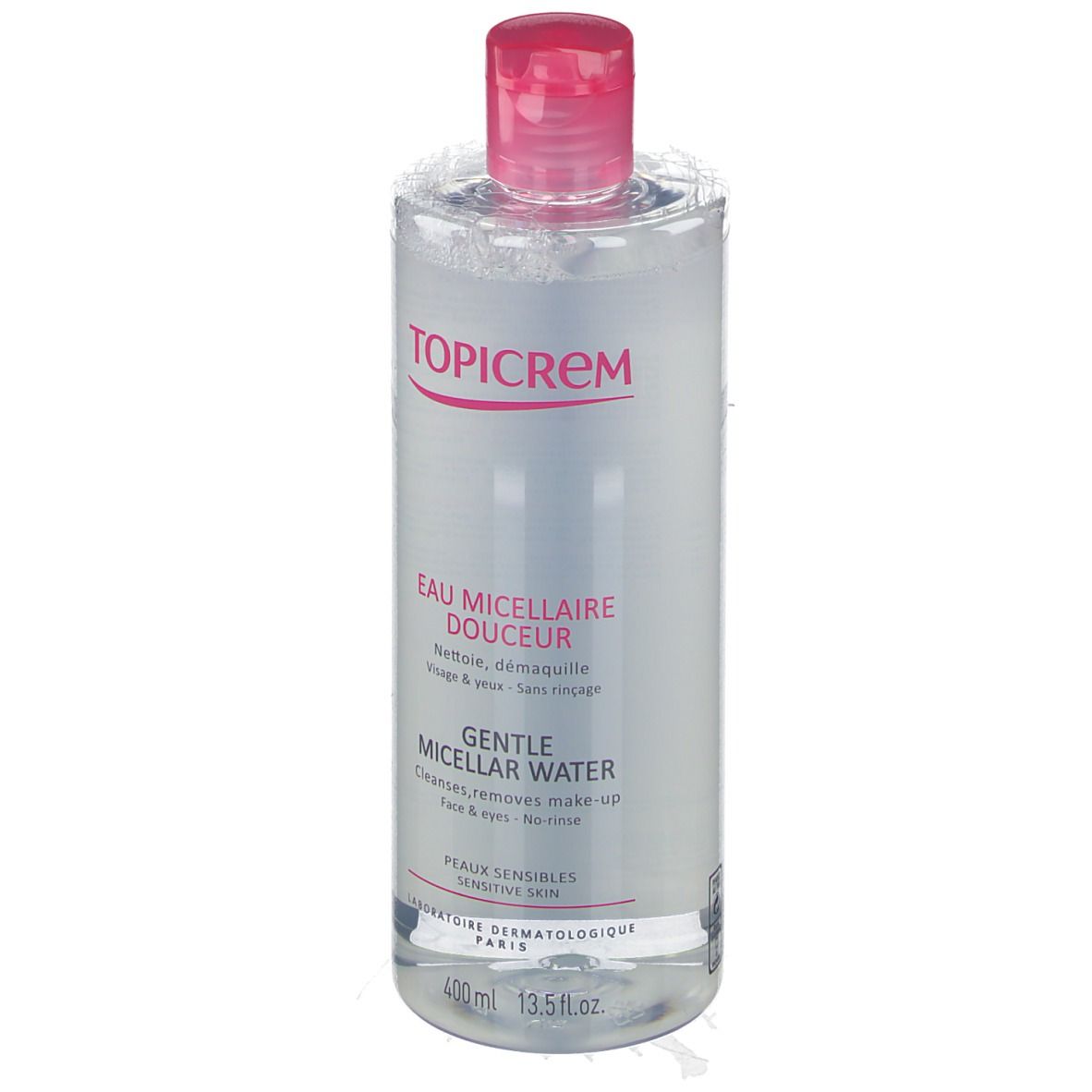 Flacon transparent, bouchon rose. Inscription TOPICREM, Eau Micellaire Douceur, Gentle Micellar Water. Pour peaux sensibles.