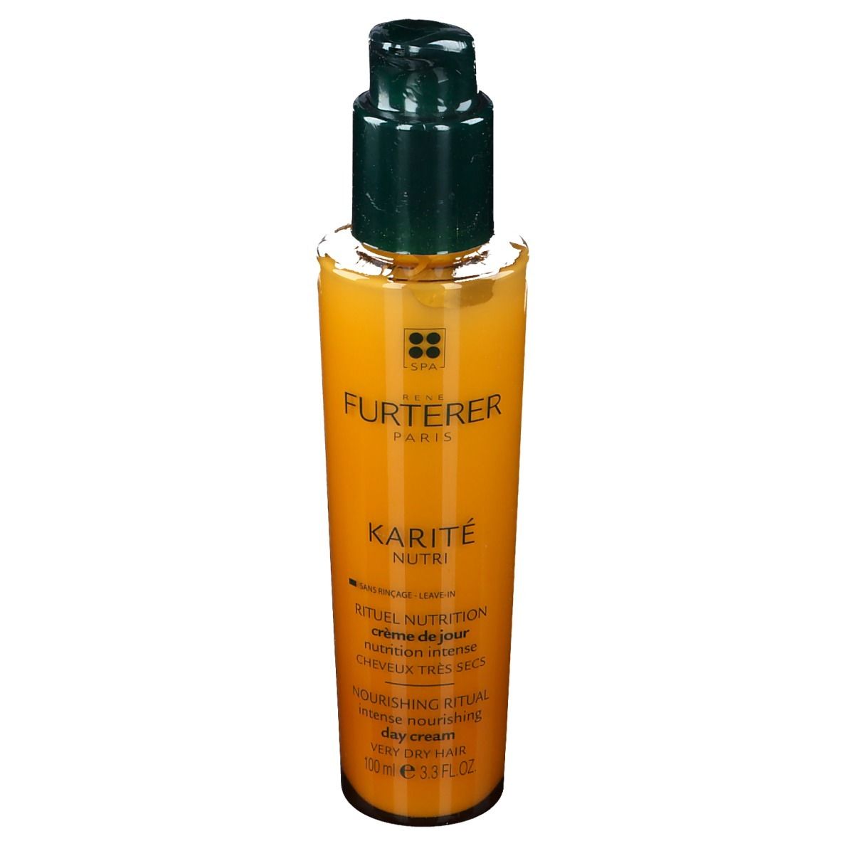 Flacon jaune avec pompe. Inscription : RENE FURTERER PARIS, KARITÉ NUTRI, crème de jour.