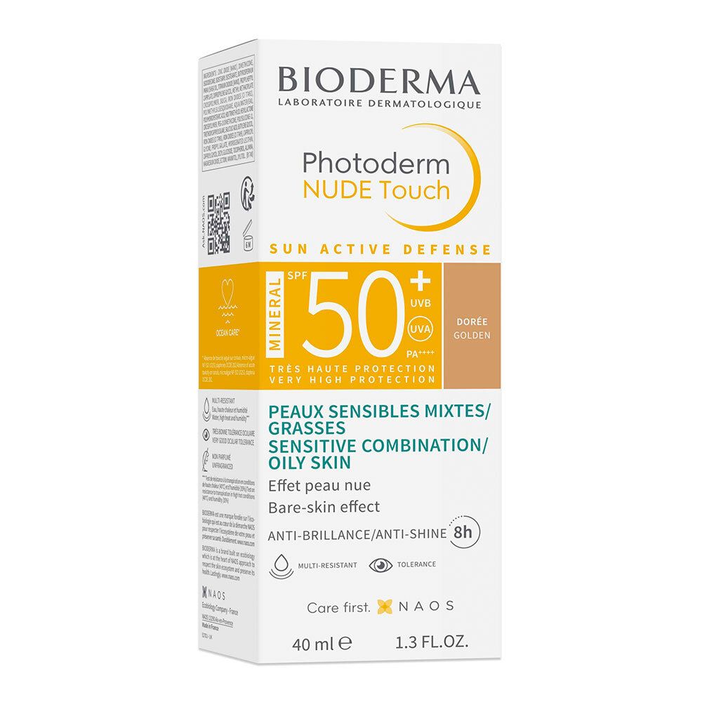 Confezione BIODERMA Photoderm NUDE Touch SPF50+. Scatola bianca con immagine e testo. Scritta: SPF 50+, Mineral.