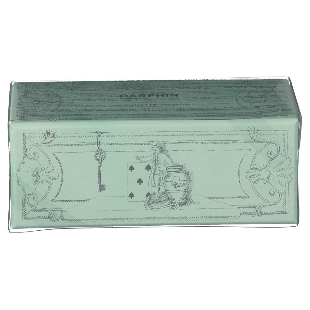 Emballage vert avec dessin. Le nom de la marque "DARPHIN" est visible sur l'emballage.