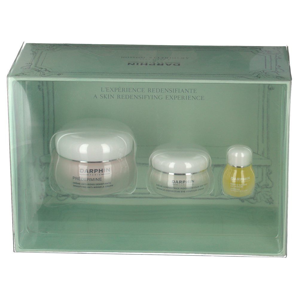 Set met drie cosmetische producten in een transparante doos. Twee crèmepotten en een flesje. Merk: DARPHIN.