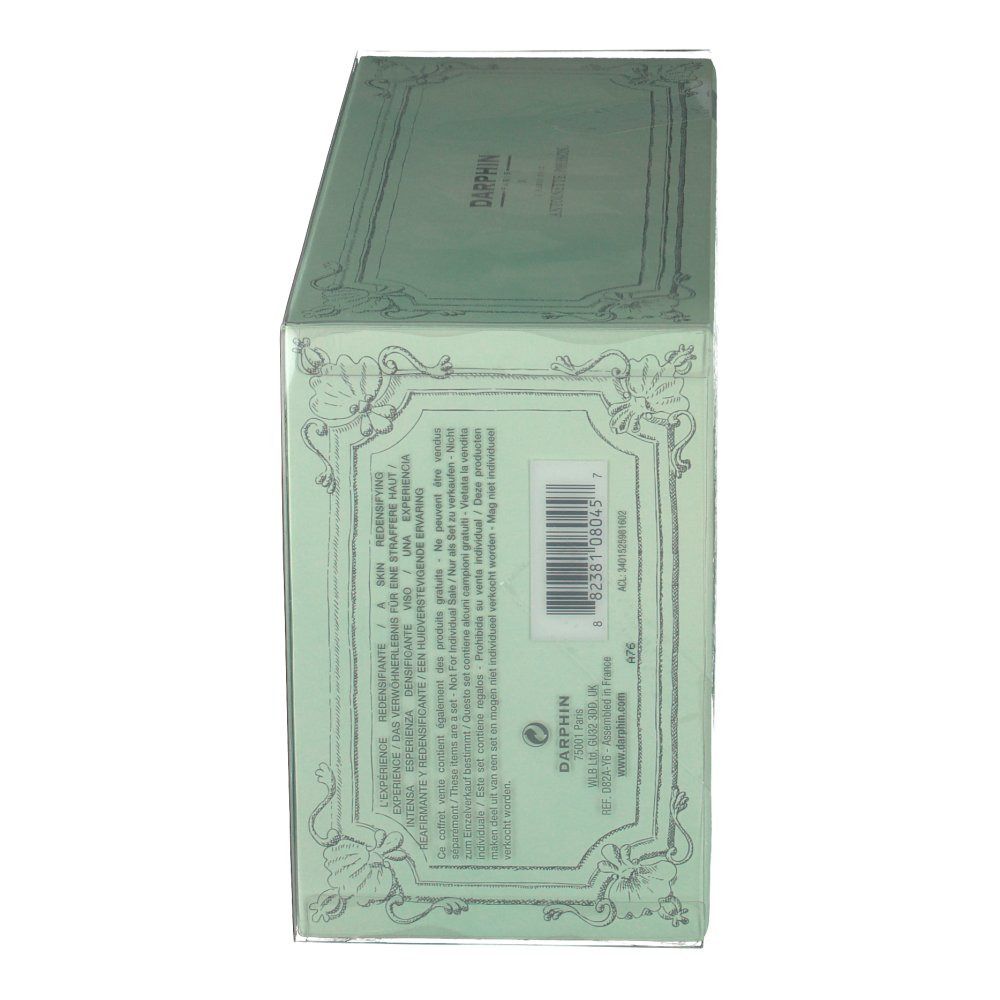 Zijaanzicht van de verpakking. Groene doos met tekst en barcode. Merk: DARPHIN. Transparante verpakking.