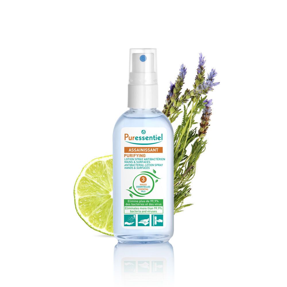 Blauwe fles met verstuiver, limoen en lavendel. Opschrift: Puressentiel, Assainissant.