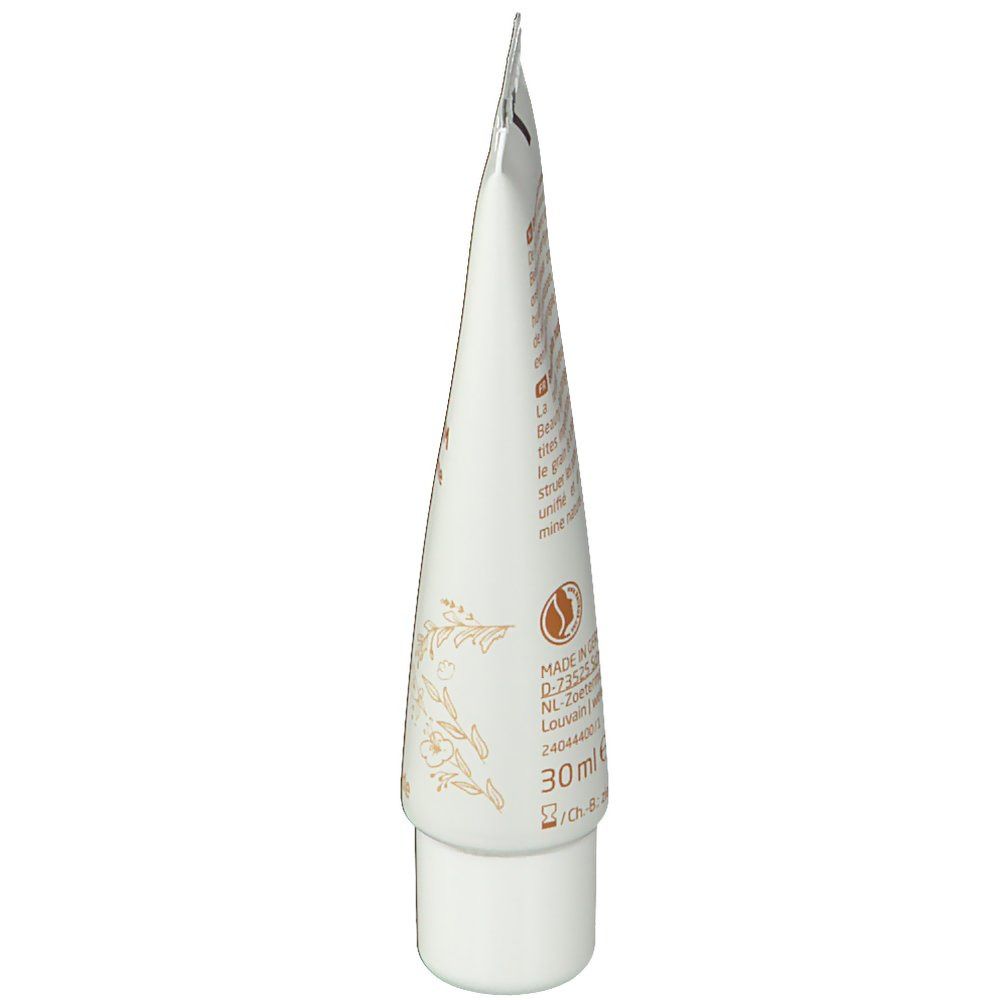 Weleda Beauty Balm Tube, Seitenansicht. Beige Tube mit floralem Muster und Schriftzug. 30ml.
