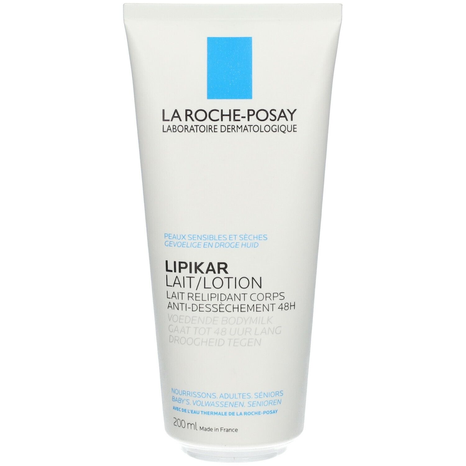 Witte tube met blauwe rechthoek en tekst. Productnaam: LIPIKAR LAIT/LOTION. Tekst: Voor gevoelige en droge huid.