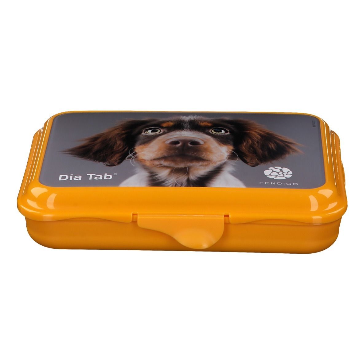 Boîte de comprimés jaune avec image de chien. Inscription: Dia Tab et FENDIGO. Ouvert.