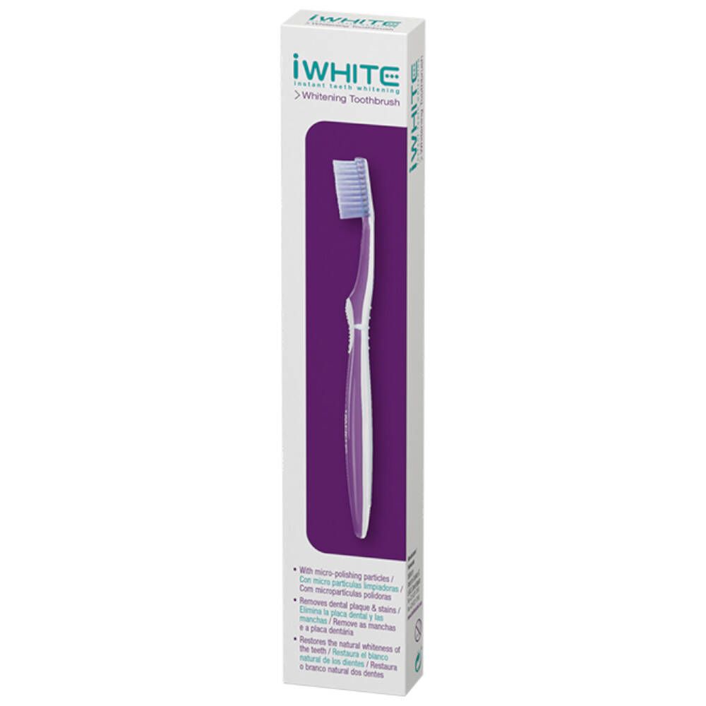 Brosse à dents dans son emballage. Manche blanc et accents violets. Soies bleues. Informations produit sur l'emballage.