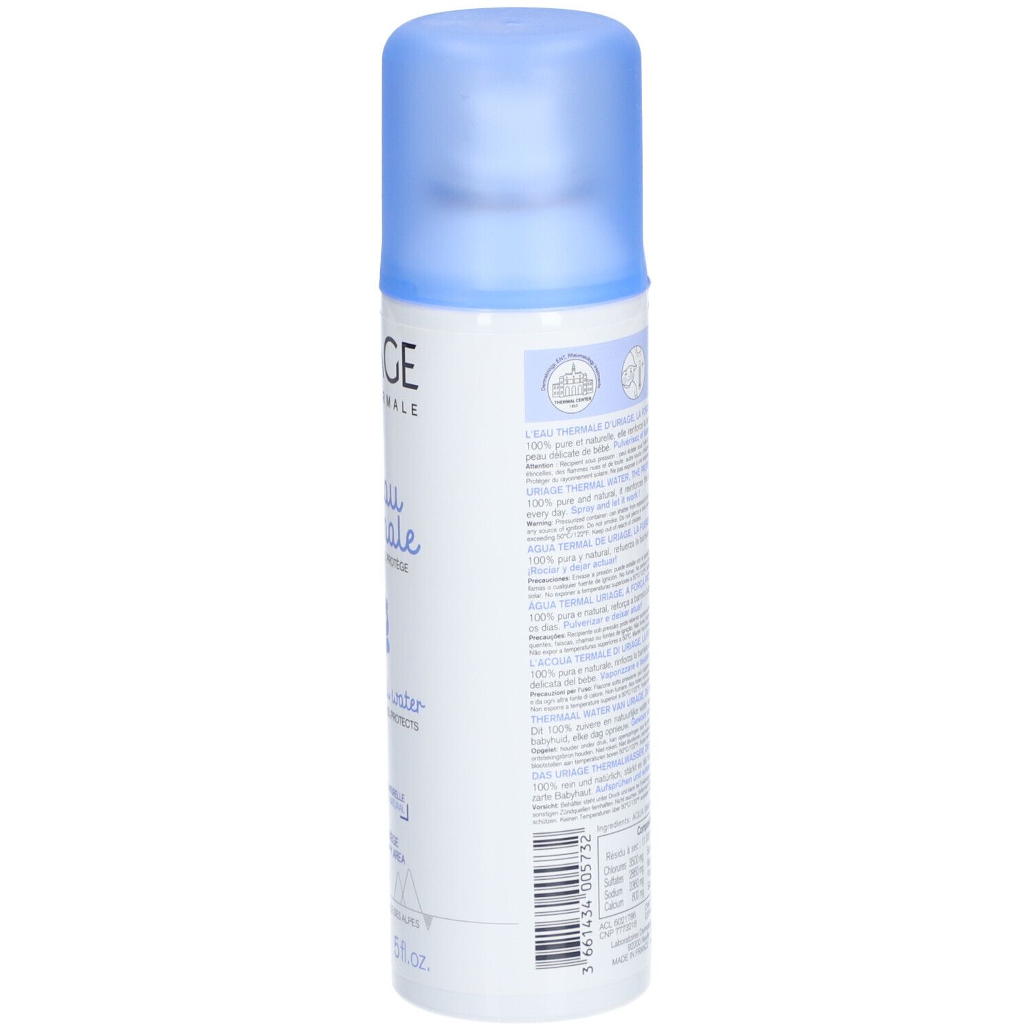 Dos du flacon spray Uriage Bébé 1ère Eau thermale. Texte: ingrédients, mode d'emploi, logos. Bouchon bleu.