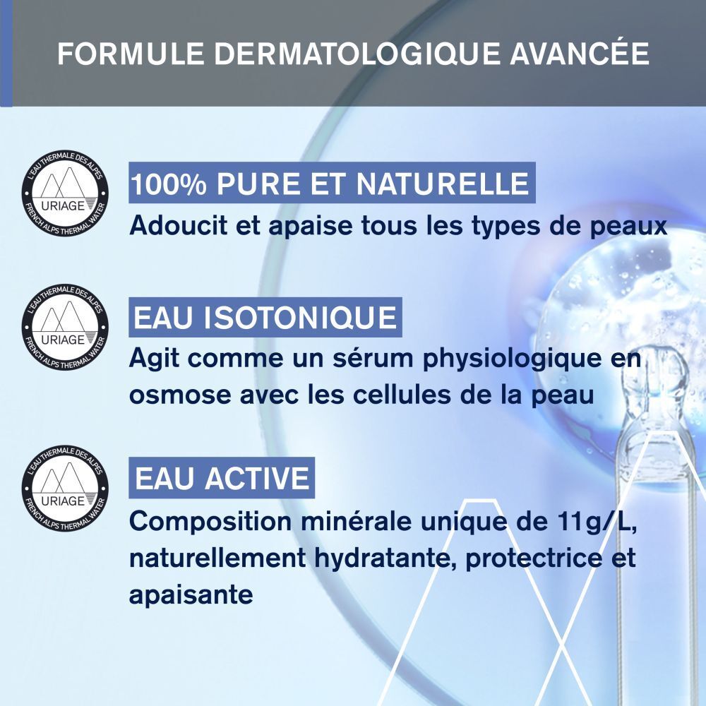 Dos du flacon spray Uriage Bébé 1ère Eau thermale. Texte: ingrédients, mode d'emploi, logos. Bouchon bleu.
