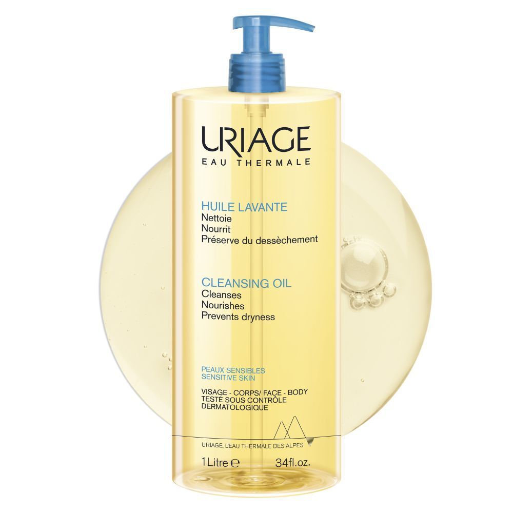 Flacon d'Huile Lavante Uriage, en gros plan. Huile transparente avec pompe bleue. Inscription: Uriage Eau Thermale.