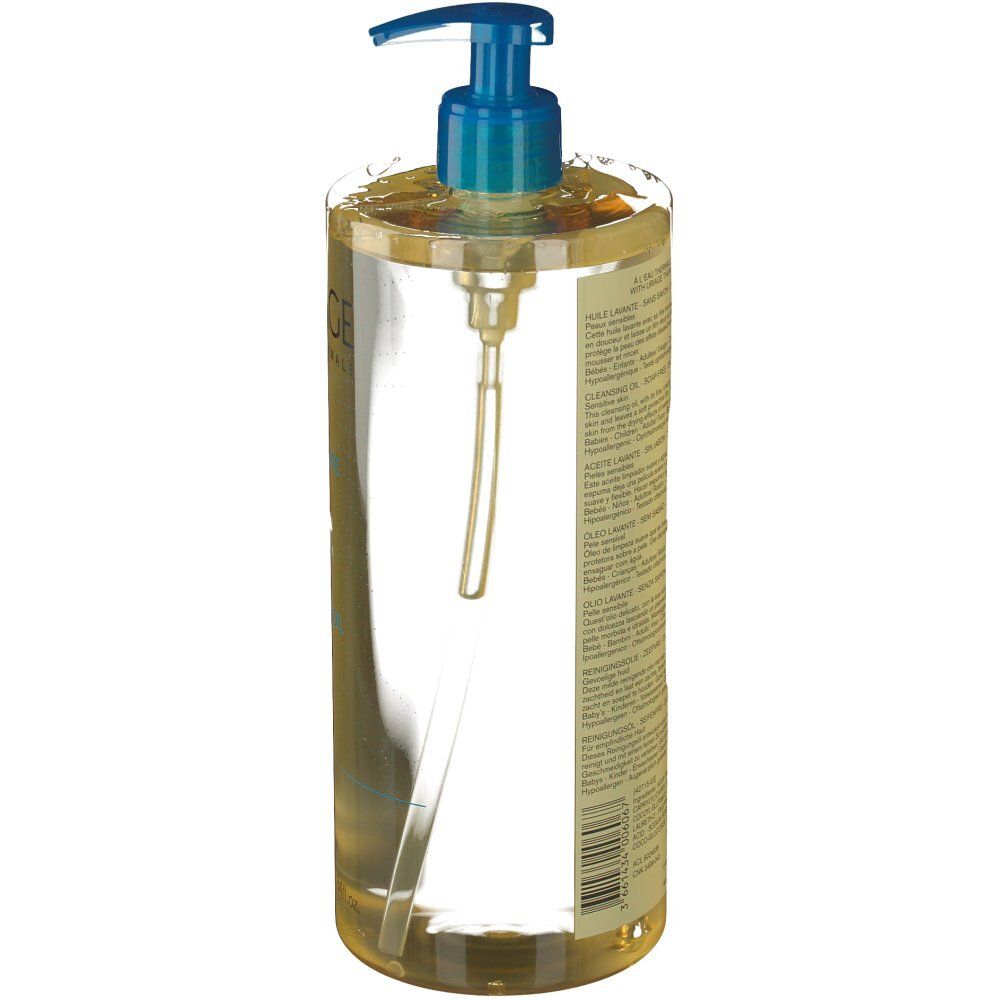 Dos du flacon d'Huile Lavante Uriage. Huile transparente avec pompe bleue. Informations produit sur l'étiquette.