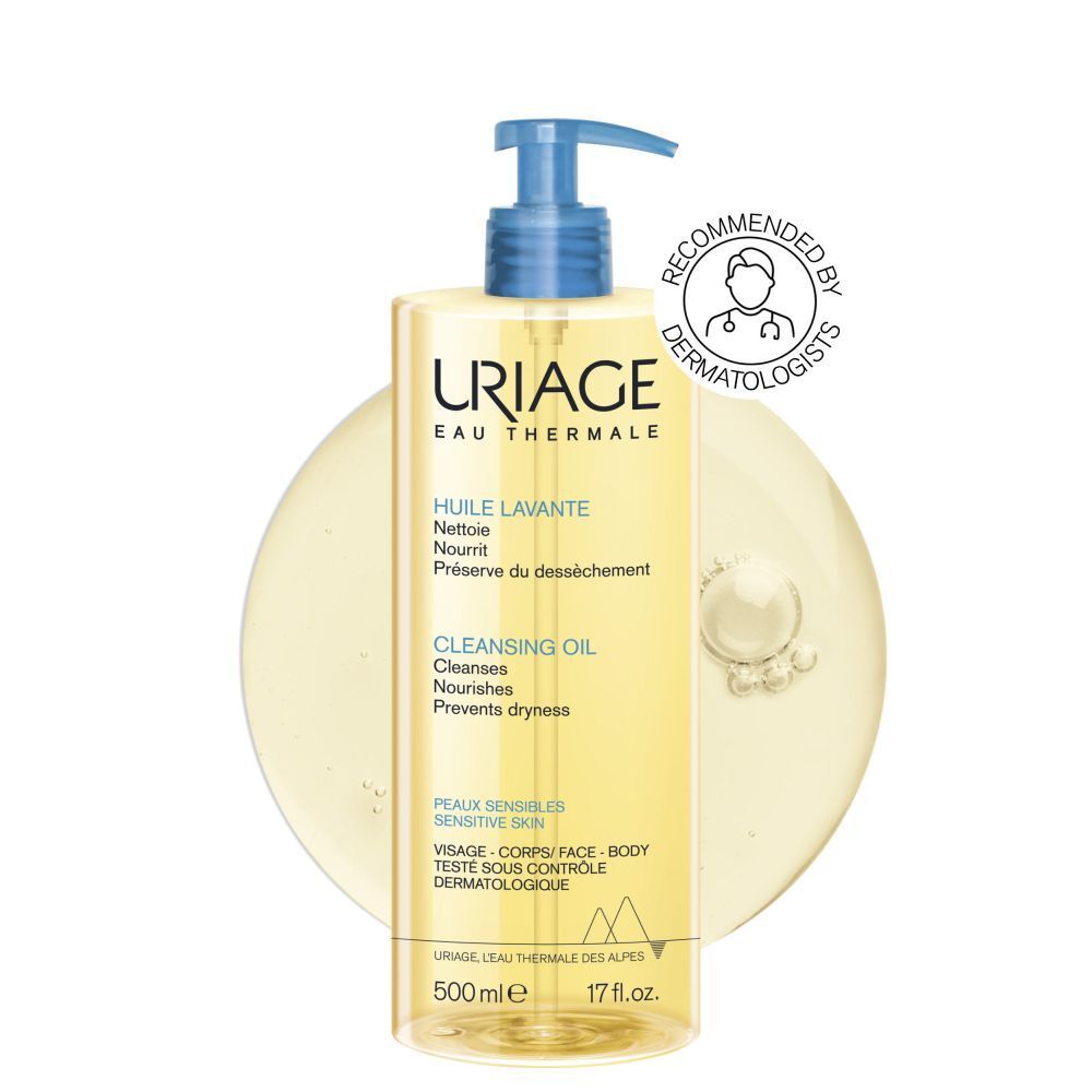 Uriage reinigingsolie fles met blauwe pomp. Opschrift: Uriage Eau Thermale, Cleansing Oil.