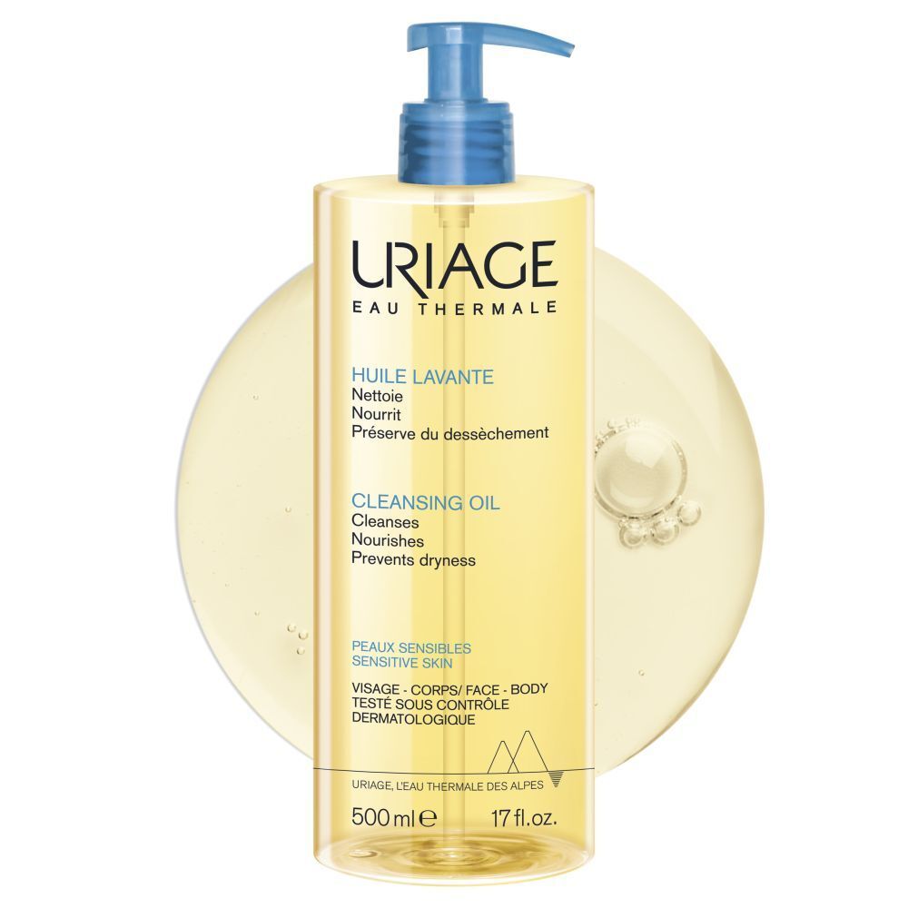 Uriage reinigingsolie fles met blauwe pomp. Opschrift: Uriage Eau Thermale, Cleansing Oil.
