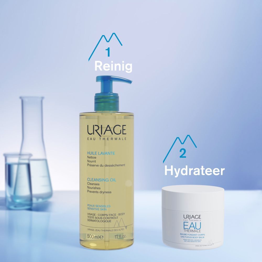 Uriage reinigingsolie fles met blauwe pomp. Opschrift: Uriage Eau Thermale, Cleansing Oil.